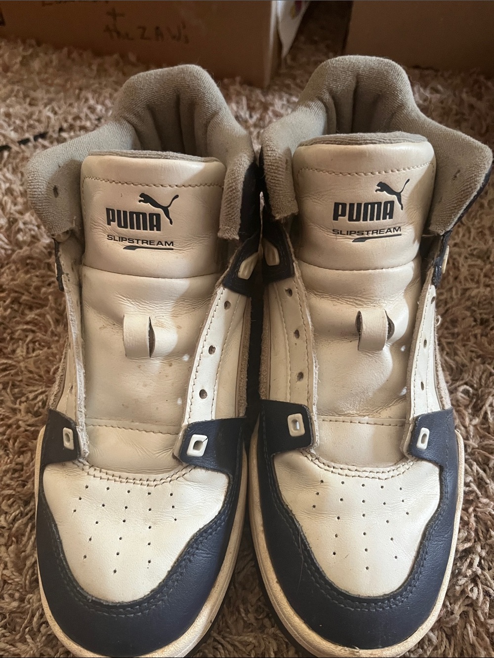 Puma Slipstream High-Top Sneakers in White and Navy
